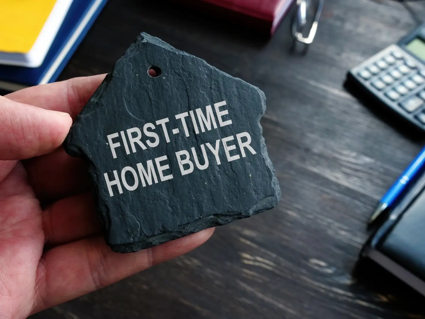 If you're a first-time homebuyer like the person pictured you want to follow these tips to avoid first-time homebuyer mistakes